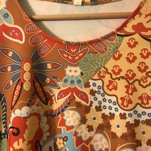 Tunic top to pair with your jeans.